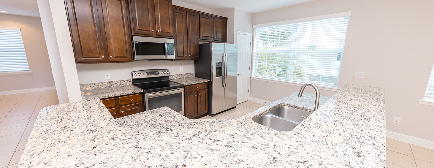 kitchen with wood cabinets and island 